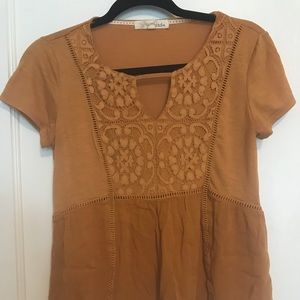 Mustard yellow peplum top.